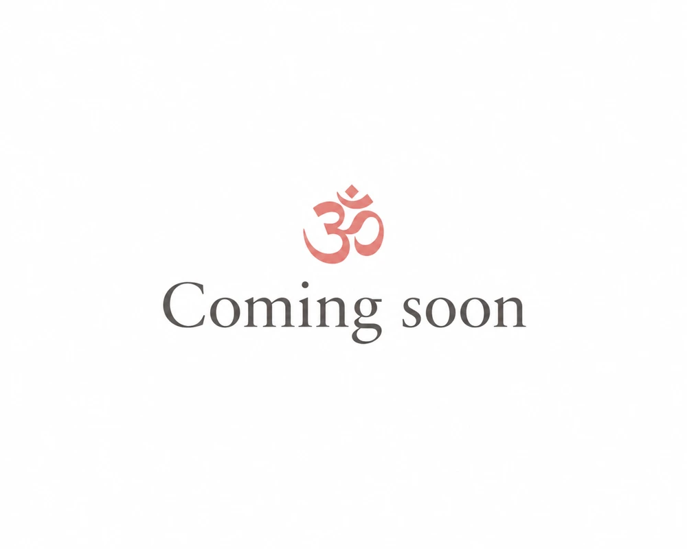 Om symbol with Coming soon on a white background